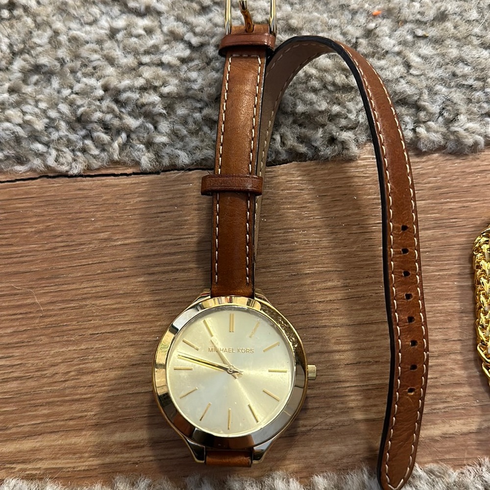 Michael Kors brown leather wrap watch, I think it needs a new battery to work